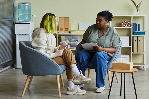 Caseworker with a client